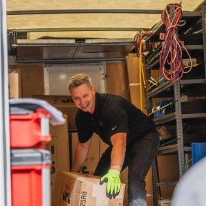 CPI technician unloading equipment from a service van